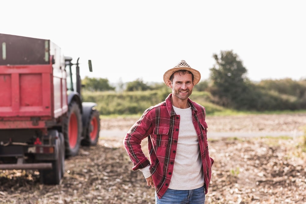 portrait-of-confident-farmer-on-field-2024-09-19-14-15-25-utc